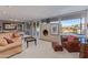 Bright living room featuring water views and ample seating at 1412 E Commodore Pl, Tempe, AZ 85283