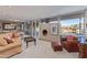 Bright living room featuring water views and ample seating at 1412 E Commodore Pl, Tempe, AZ 85283