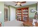 Home office with built-in bookshelves and desk at 1412 E Commodore Pl, Tempe, AZ 85283
