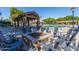 Relaxing poolside patio with fire pit and seating at 1412 E Commodore Pl, Tempe, AZ 85283