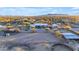 Aerial view of a large estate with pool, stables and desert landscape at 14236 E Ranch Rd, Scottsdale, AZ 85262