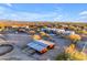 Aerial view of property showing home, barn, and surrounding landscape at 14236 E Ranch Rd, Scottsdale, AZ 85262