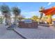Outdoor kitchen with built-in grill at 14236 E Ranch Rd, Scottsdale, AZ 85262