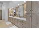 Spa-like bathroom with double vanity and modern light fixtures at 14236 E Ranch Rd, Scottsdale, AZ 85262