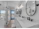 Modern bathroom with double vanity and walk-in shower at 14236 E Ranch Rd, Scottsdale, AZ 85262