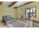 Cozy bedroom with access to a private patio at 14236 E Ranch Rd, Scottsdale, AZ 85262