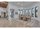 Elegant dining room with a large table and scenic views at 14236 E Ranch Rd, Scottsdale, AZ 85262