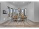Bright dining room featuring a rustic wooden table and chandelier at 14236 E Ranch Rd, Scottsdale, AZ 85262