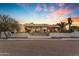 Elegant home showcasing a beautiful pool and desert landscape at 14236 E Ranch Rd, Scottsdale, AZ 85262