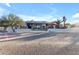 Luxury home exterior with pool and desert landscaping at 14236 E Ranch Rd, Scottsdale, AZ 85262