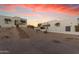 Modern home exterior with desert landscaping and sunset view at 14236 E Ranch Rd, Scottsdale, AZ 85262