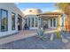 View of the home's entrance, showcasing the architecture and landscaping at 14236 E Ranch Rd, Scottsdale, AZ 85262