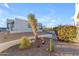 Landscaped front yard with desert plants and gravel at 14236 E Ranch Rd, Scottsdale, AZ 85262