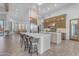 Modern kitchen with island and stainless steel appliances at 14236 E Ranch Rd, Scottsdale, AZ 85262