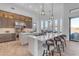 Modern kitchen with large island, stainless steel appliances, and ample cabinetry at 14236 E Ranch Rd, Scottsdale, AZ 85262