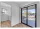 Laundry room with sliding door to patio at 14236 E Ranch Rd, Scottsdale, AZ 85262