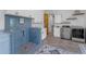 Bright laundry room with a dog washing station and modern appliances at 14236 E Ranch Rd, Scottsdale, AZ 85262