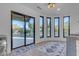 Laundry room with backyard access, tile flooring, and a built-in dog wash at 14236 E Ranch Rd, Scottsdale, AZ 85262