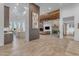 Open concept living area with fireplace and high ceilings at 14236 E Ranch Rd, Scottsdale, AZ 85262