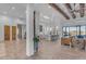 Open floor plan with a kitchen, living area, and fireplace at 14236 E Ranch Rd, Scottsdale, AZ 85262