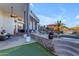 Spacious patio with seating, putting green, and pool views at 14236 E Ranch Rd, Scottsdale, AZ 85262