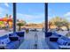 Relaxing patio furniture with a pool view at 14236 E Ranch Rd, Scottsdale, AZ 85262