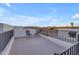 Private rooftop deck with scenic views and two metal chairs at 14236 E Ranch Rd, Scottsdale, AZ 85262