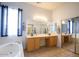Double vanity bathroom with soaking tub and shower at 15720 E Yucca Dr, Fountain Hills, AZ 85268