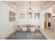 Elegant dining room with chandelier and glass-top table at 15720 E Yucca Dr, Fountain Hills, AZ 85268