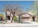 Single-story home with desert landscaping and two-car garage at 15720 E Yucca Dr, Fountain Hills, AZ 85268