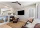 Cozy Gathering room featuring a fireplace and large TV at 15720 E Yucca Dr, Fountain Hills, AZ 85268