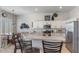 Modern kitchen with white cabinets and an island breakfast bar at 15720 E Yucca Dr, Fountain Hills, AZ 85268
