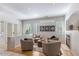 Bright living room with fireplace and comfortable seating area at 15720 E Yucca Dr, Fountain Hills, AZ 85268