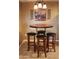Charming breakfast nook with round table and four stools at 1720 E Thunderbird Rd # 2059, Phoenix, AZ 85022