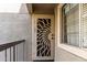 Condo entry with security door and window at 1720 E Thunderbird Rd # 2059, Phoenix, AZ 85022