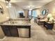 Kitchen with view into living room at 1720 E Thunderbird Rd # 2059, Phoenix, AZ 85022