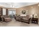 Living room with couch, chair, and decorative pieces at 1720 E Thunderbird Rd # 2059, Phoenix, AZ 85022