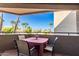 Private patio with table and chairs, overlooking a courtyard at 1720 E Thunderbird Rd # 2059, Phoenix, AZ 85022
