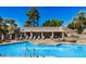 Relaxing community pool with lounge chairs and a clubhouse at 1720 E Thunderbird Rd # 2059, Phoenix, AZ 85022