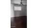 Bedroom with dark wood-look flooring and ceiling fan at 18202 N Cave Creek Rd # 128, Phoenix, AZ 85032