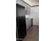 Gray cabinets and black appliances in this updated kitchen at 18202 N Cave Creek Rd # 128, Phoenix, AZ 85032