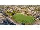 Aerial view of a neighborhood park and surrounding homes at 1976 S 172Nd Ln, Goodyear, AZ 85338
