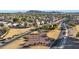 Aerial view of neighborhood with roads and landscaping at 1976 S 172Nd Ln, Goodyear, AZ 85338