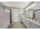 Bathroom boasts double vanity, shower, and bathtub at 1976 S 172Nd Ln, Goodyear, AZ 85338