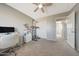 Bright bedroom with large closet and access to hallway at 1976 S 172Nd Ln, Goodyear, AZ 85338