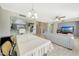 Dining area with table, chairs, and view into living room at 1976 S 172Nd Ln, Goodyear, AZ 85338