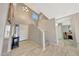 Bright and spacious entryway with tiled floors and staircase at 1976 S 172Nd Ln, Goodyear, AZ 85338