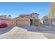 Two-story house with a two-car garage and landscaped front yard at 1976 S 172Nd Ln, Goodyear, AZ 85338