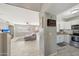 Open kitchen with granite countertops and stainless steel appliances at 1976 S 172Nd Ln, Goodyear, AZ 85338