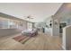 Living room with tile floors and a comfortable sectional sofa at 1976 S 172Nd Ln, Goodyear, AZ 85338
